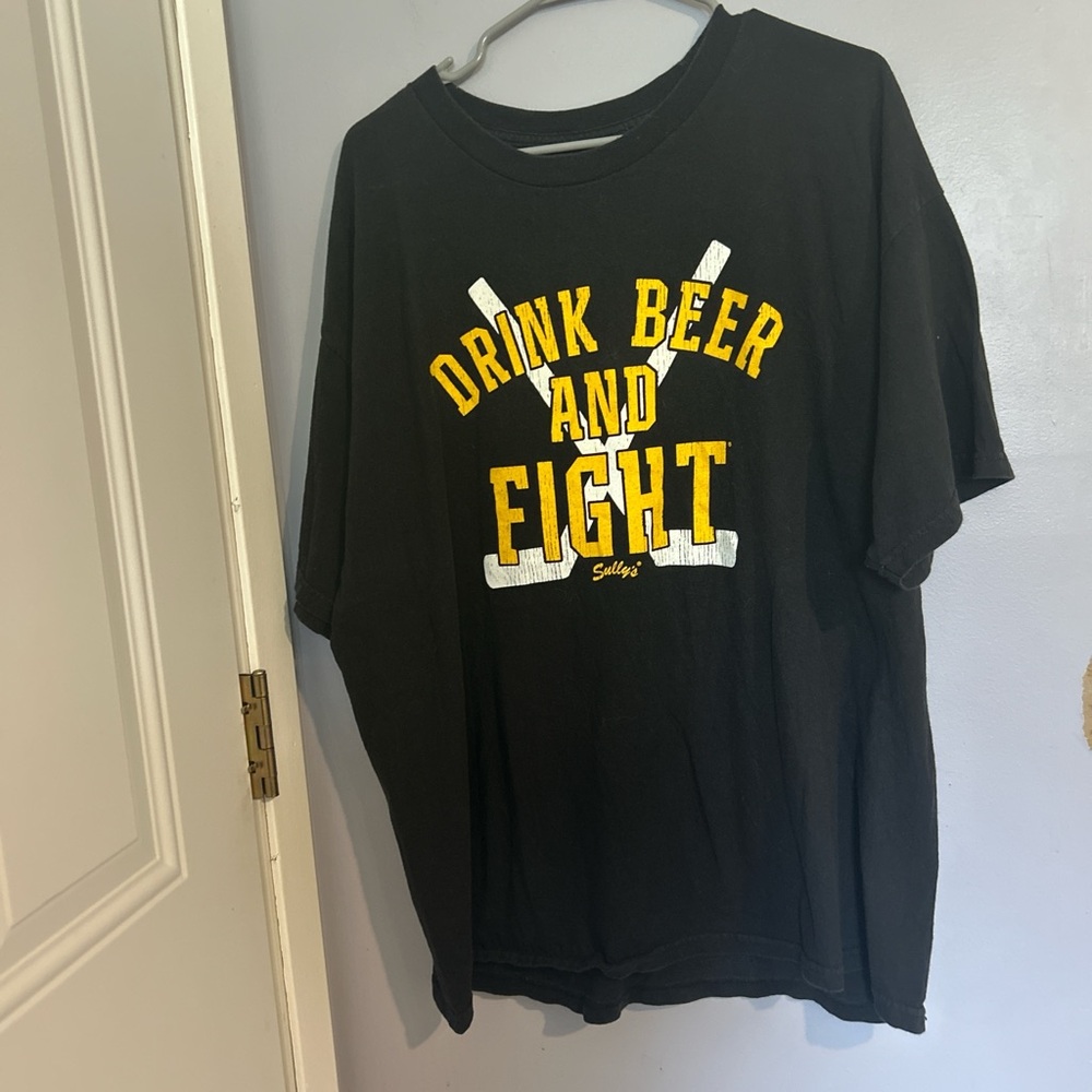 Shully's Black Tee with Bold Yellow Print